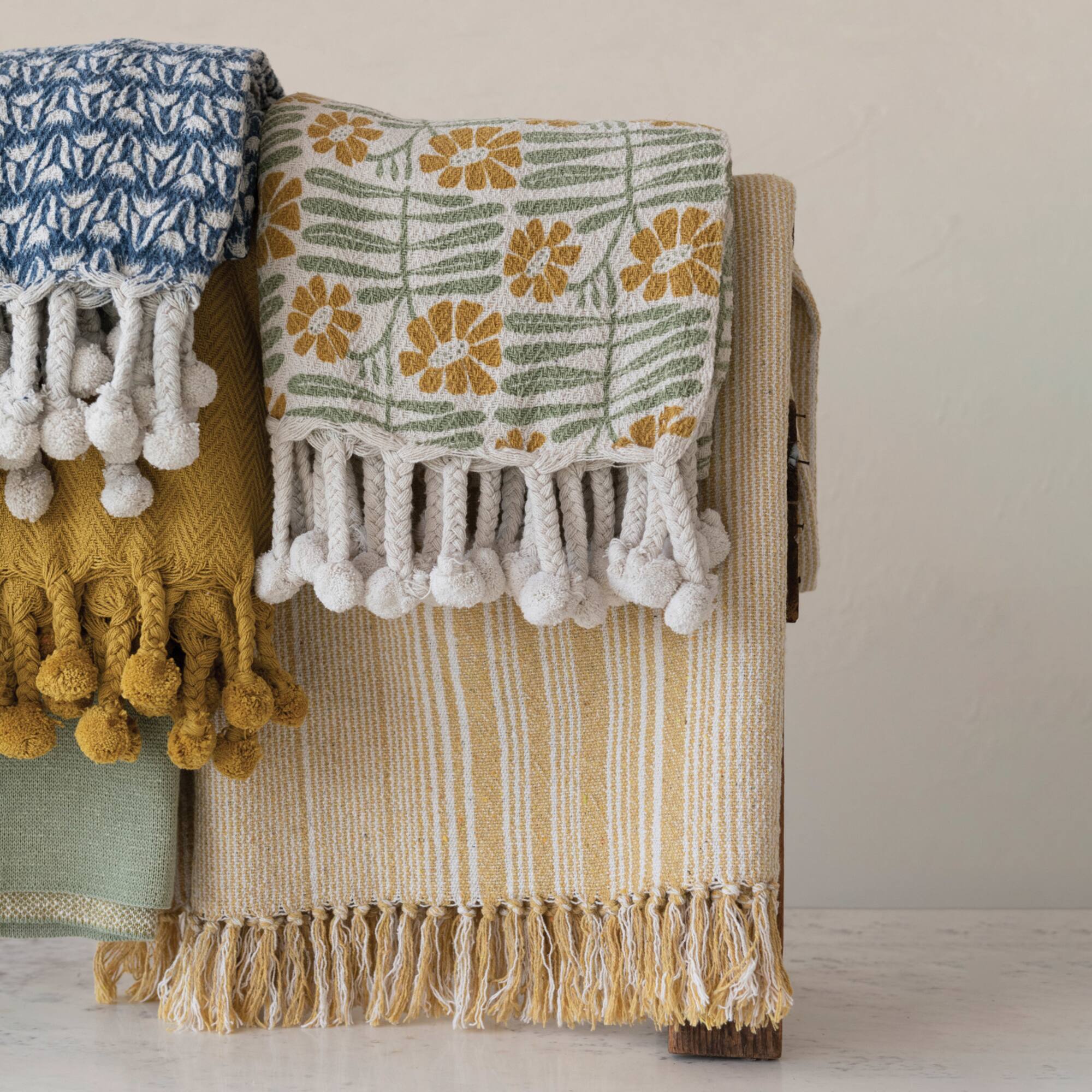 Hello Honey® Woven Recycled Cotton Blend Printed Throw with Flowers and Braided Pom Pom Tassels, Sage and Mustard